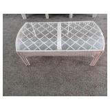Benchcraft glass top rattan coffee table