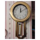 Battery operated hanging wall clock