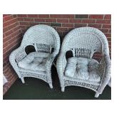 Two wicker outdoor chairs