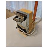 Oster electric can opener/knife sharpener