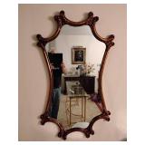 Ornate framed wall mirror
