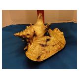 Decorative gold painted conch shell sculpture