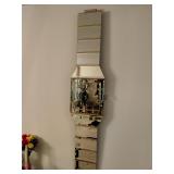 Wrist watch style wall mirror clock