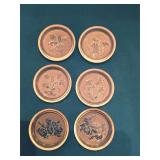 Glass coasters with floral design