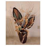 Large decorative vase with floral arrangement