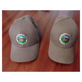 Two Halifax county baseball caps