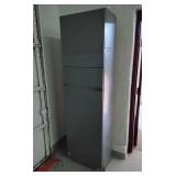 Wall anchored storage cabinet