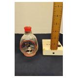 Painted pinched bottle