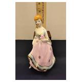 Porcelain pink lady colonial figurine