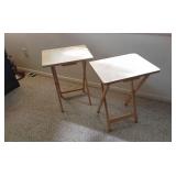 Two folding tray tables