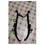 Primitive cast iron horse hames repurposed