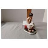 Saturday evening post figurine, repaired