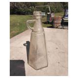 Vintage log cabin syrup bottle