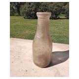 One quart vintage milk bottle