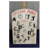 Cats initial pins display w/ pins