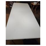 Folding table items in background not included