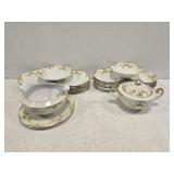Partial set of hand painted meito china dishes