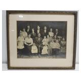 Antique brass like framed family picture