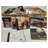 Wicker basket full of CDs variety of music