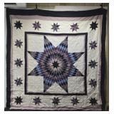 100" by 90" multi colored quilt