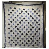 83" by 95" blue and white quilt