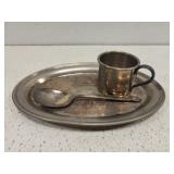 Silver on copper plate with metal spoon and cup Silver on copper plate with metal spoon and cup
