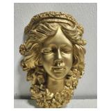 Wall decor of golden woman Wall decor of golden woman