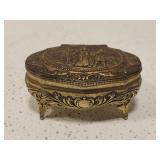 Small gold colored metal trinket box Small gold colored metal trinket box