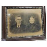 Antique wooden framed of old couple Antique wooden framed of old couple