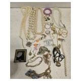 Estate lot of costume jewley and 2 sterling pieces Estate lot of costume jewley and 2 sterling pieces