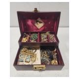 Jewelry box full of misc costume jewelry Jewelry box full of misc costume jewelry