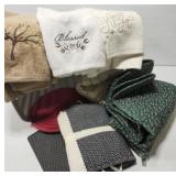 Plastic bin with kitchen towels and More