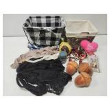 2 small baskets with misc items (hair accessories)