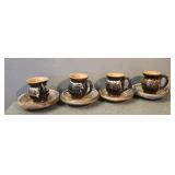 Set if pottery teacups & saucers