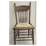 Antique wooden chair w crochet cushion