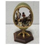 Egg shaped bird habitat Figurine