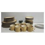 Aprox 39 pieces of International yellow dishes