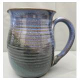 Hand-thrown stoneware pottery mug with