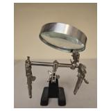 Helping hand with magnifying glass