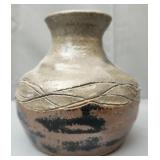 Vintage pottery vase w an abstract design