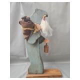 hand-carved folk art wooden Santa figure