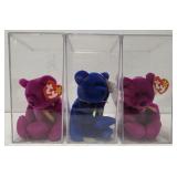 3 collectible beanie babies in cases