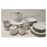 24 pieces of white and silver dishes and more