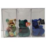 3 collectible beanie babies in cases