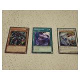 3 misc yu-gi-oh trading cards