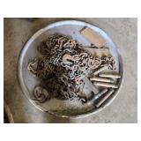 Tray full of hardware and chains