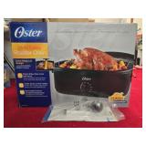 Oster 24-Ib roaster oven in the box