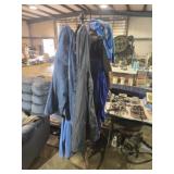 Wood coat hanger with coats