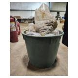 Green planter full of screws