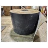 Roll of heavy industrial conveyor belt